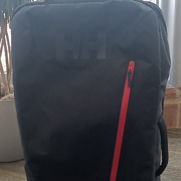 Hailey Hansen roll behind luggage - Picture 2 of 3